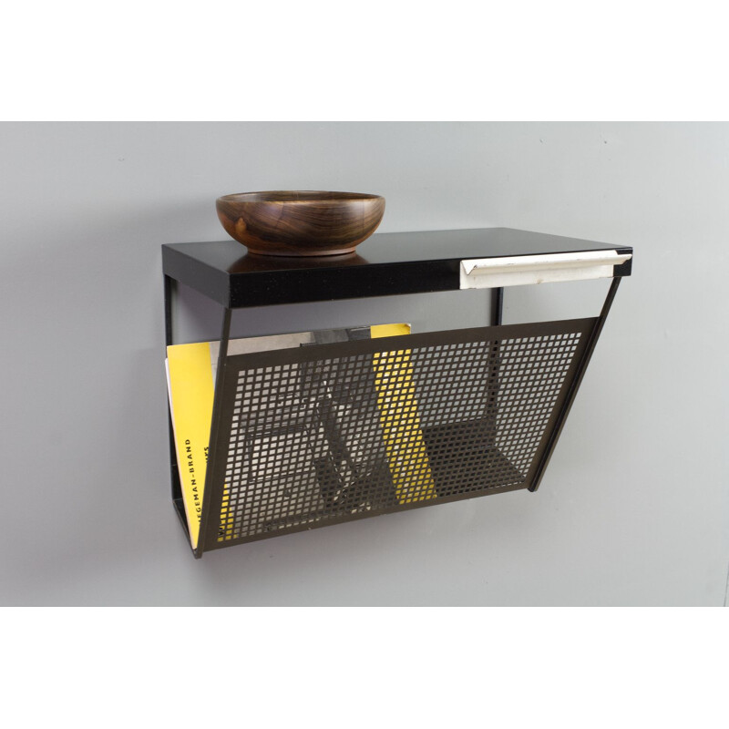 Vintage black magazine rack by Tjerk Reijenga for Pilastro 1960