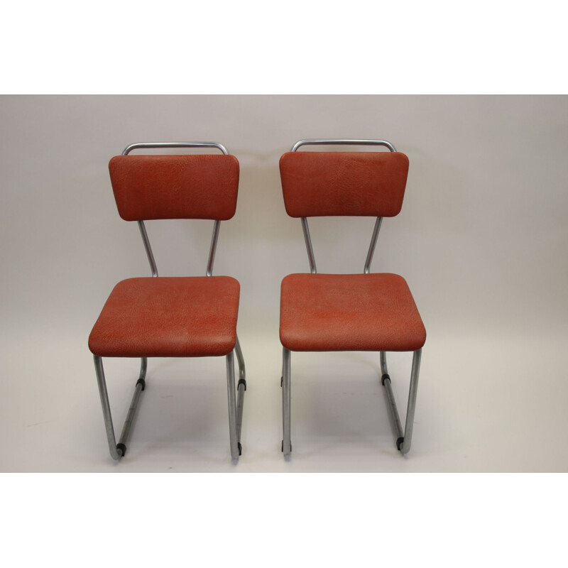 Set of 4 vintage tubular frame dining room chairs model 114 and 214 Gispen