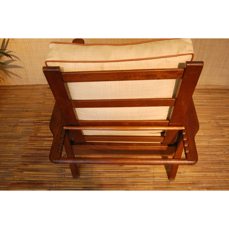 Mid-century colonial style armchair in solid teak and raffia - 1950