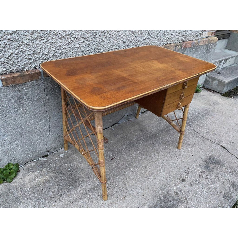 Bureau vintage avec 3 tiroirs en rotin de Louis Sognot 1960