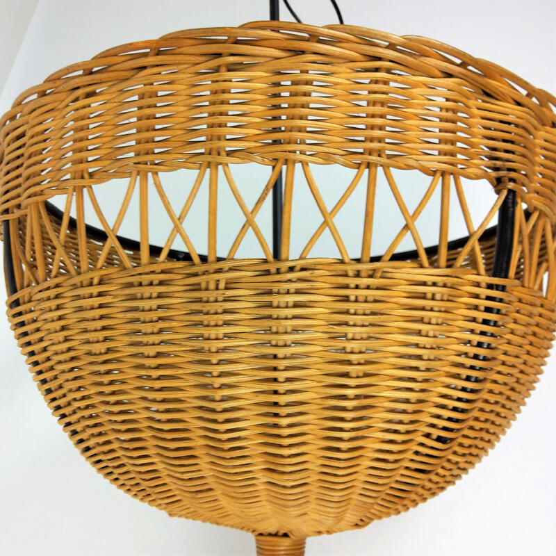 Vintage rattan basket on 4 black lacquered metal legs, 1950