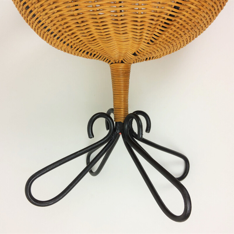 Vintage rattan basket on 4 black lacquered metal legs, 1950