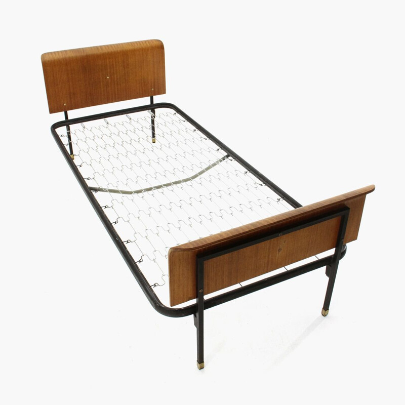 Cama individual vintage con cabecero y piecero de madera contrachapada curvada 1950