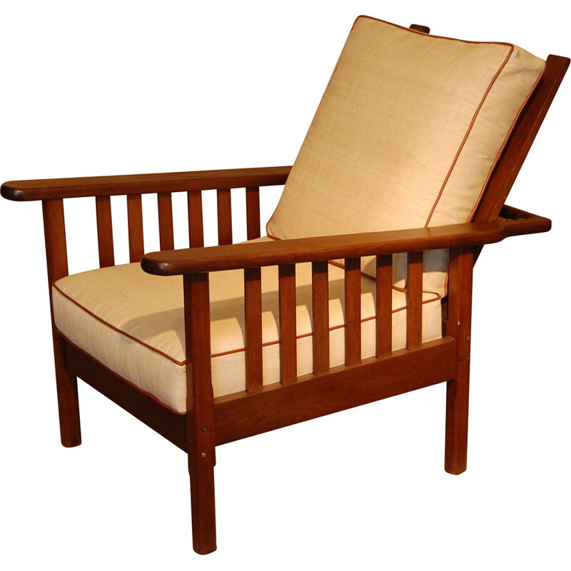 Mid-century colonial style armchair in solid teak and raffia - 1950