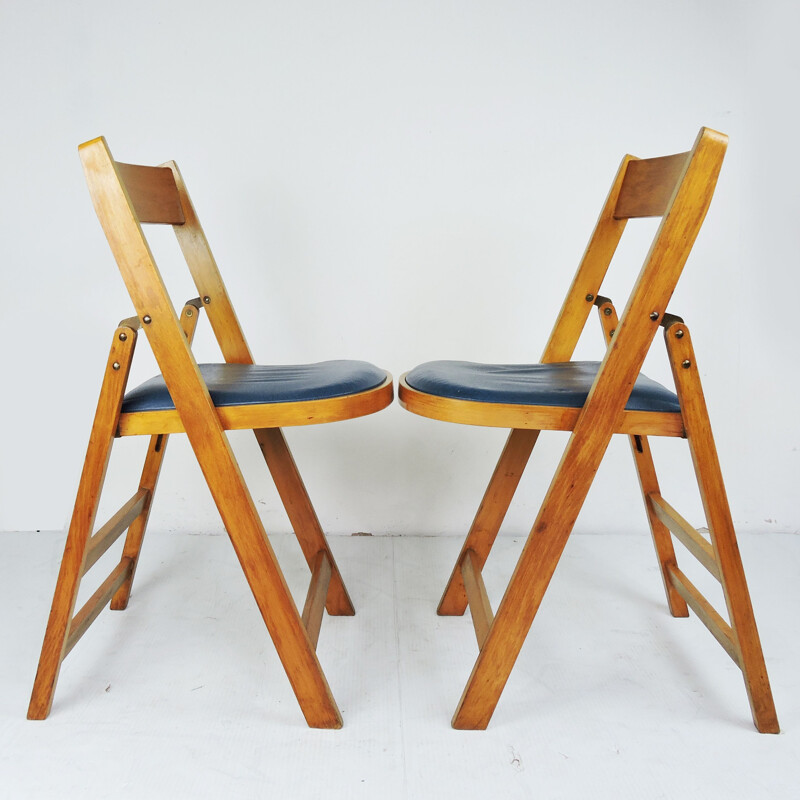 Pair of vintage Wooden Folding Chairs With Blue Vinyl Seats Made In Yugoslavia by Stoe Benchairs