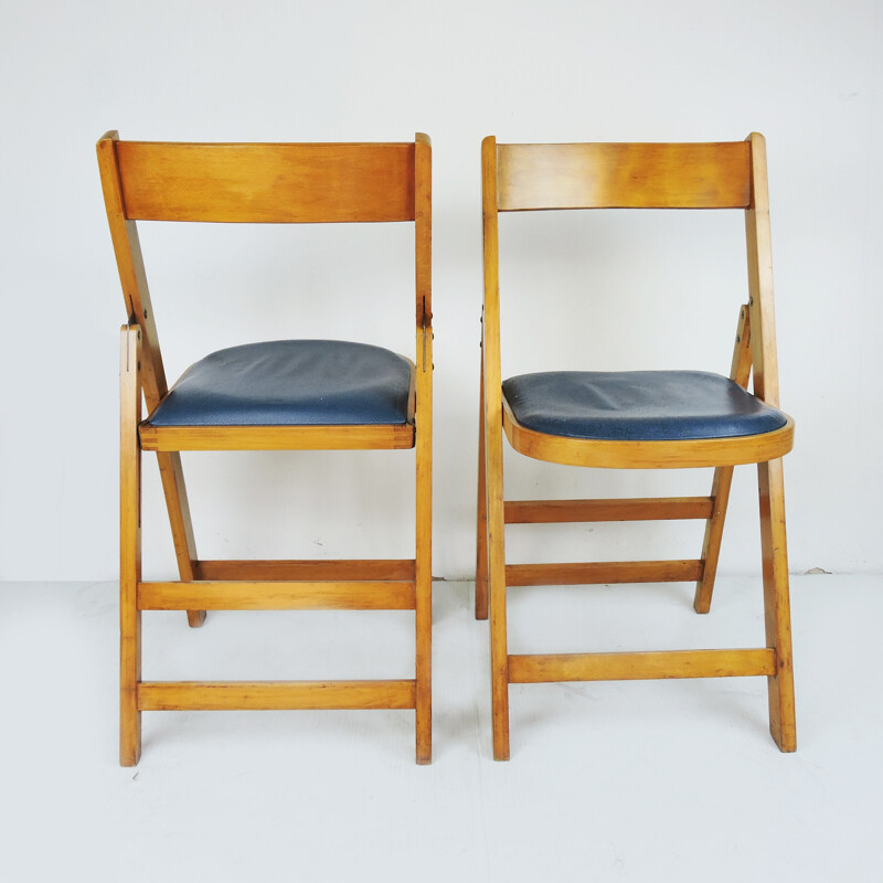 Pair of vintage Wooden Folding Chairs With Blue Vinyl Seats Made In Yugoslavia by Stoe Benchairs