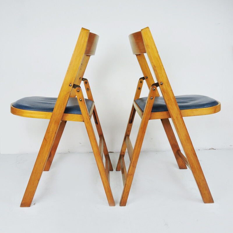 Pair of vintage Wooden Folding Chairs With Blue Vinyl Seats Made In Yugoslavia by Stoe Benchairs