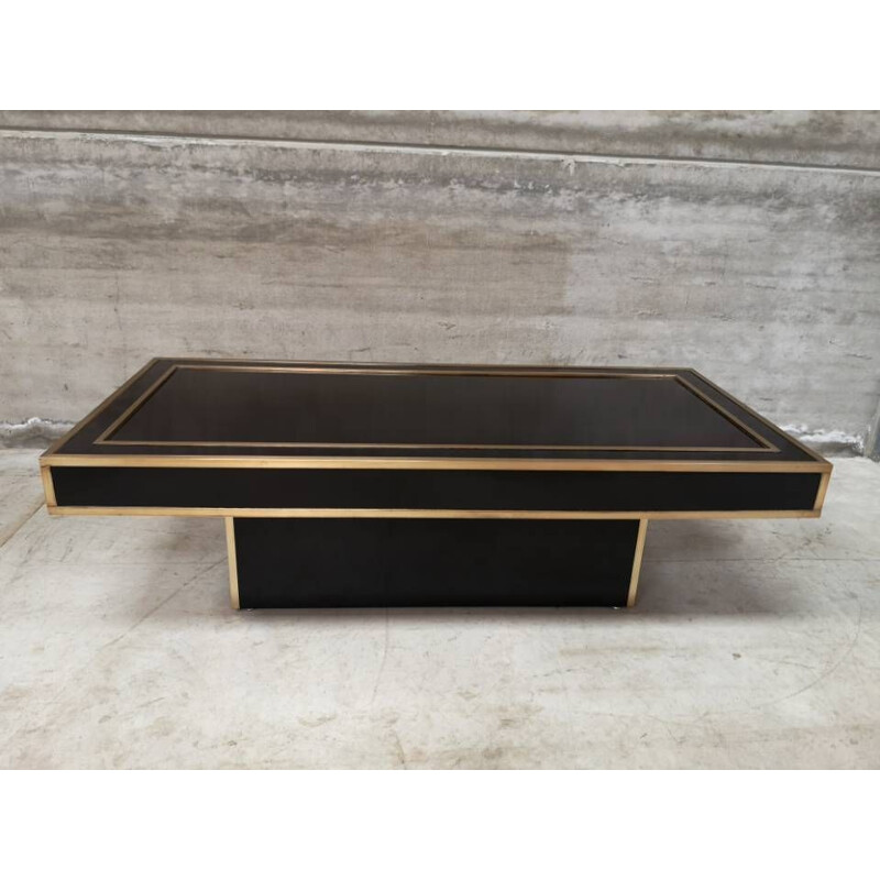 Vintage coffee table in brass and black lacquer by Jean-Claude Mahey, 1970