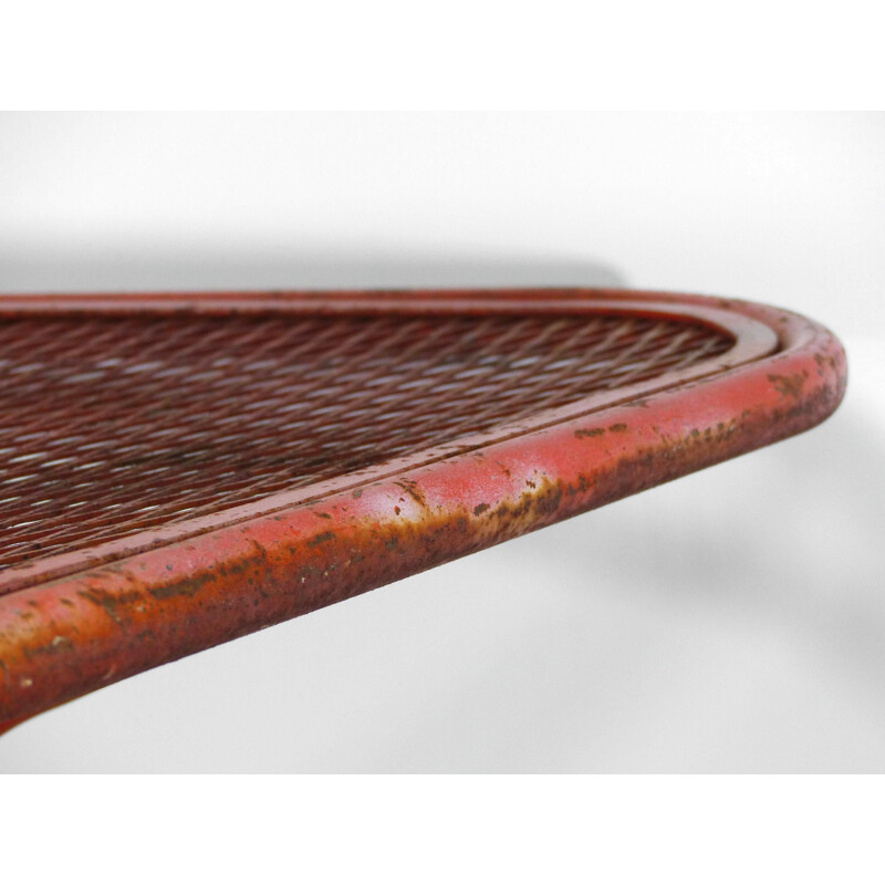 Vintage industrial orange saddle table 