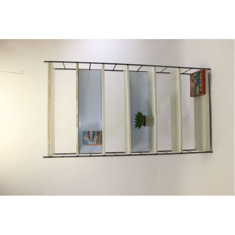 Grey metal wall bookcase