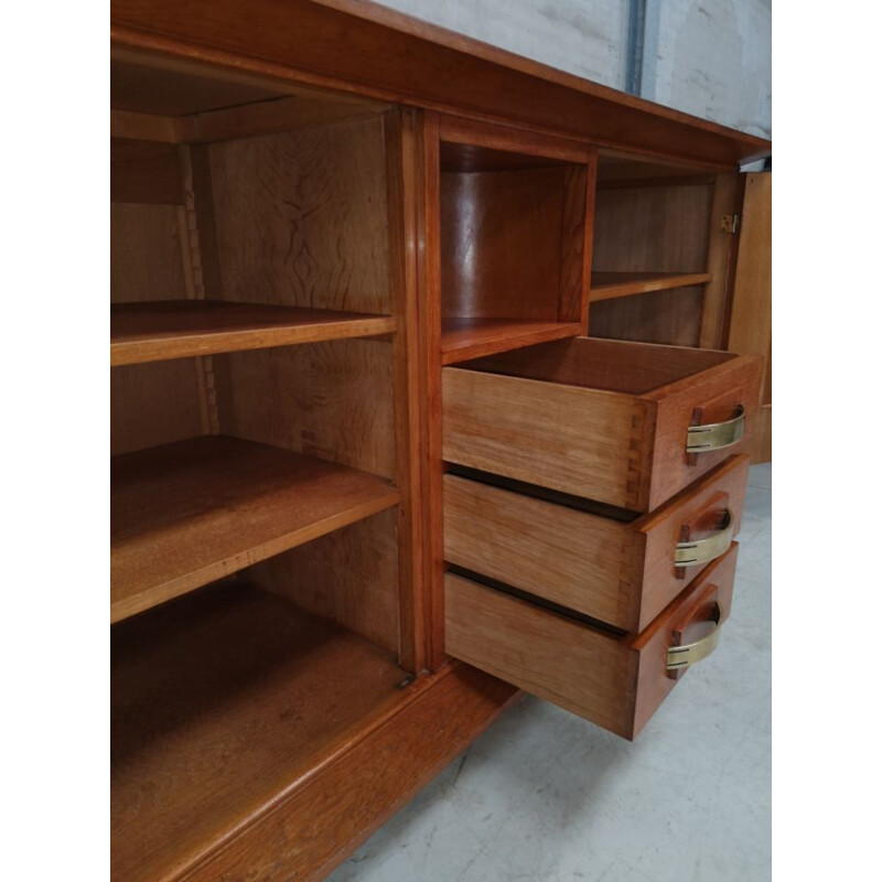 Vintage art deco chest of drawers in solid oak by Jean Royère, France 1940