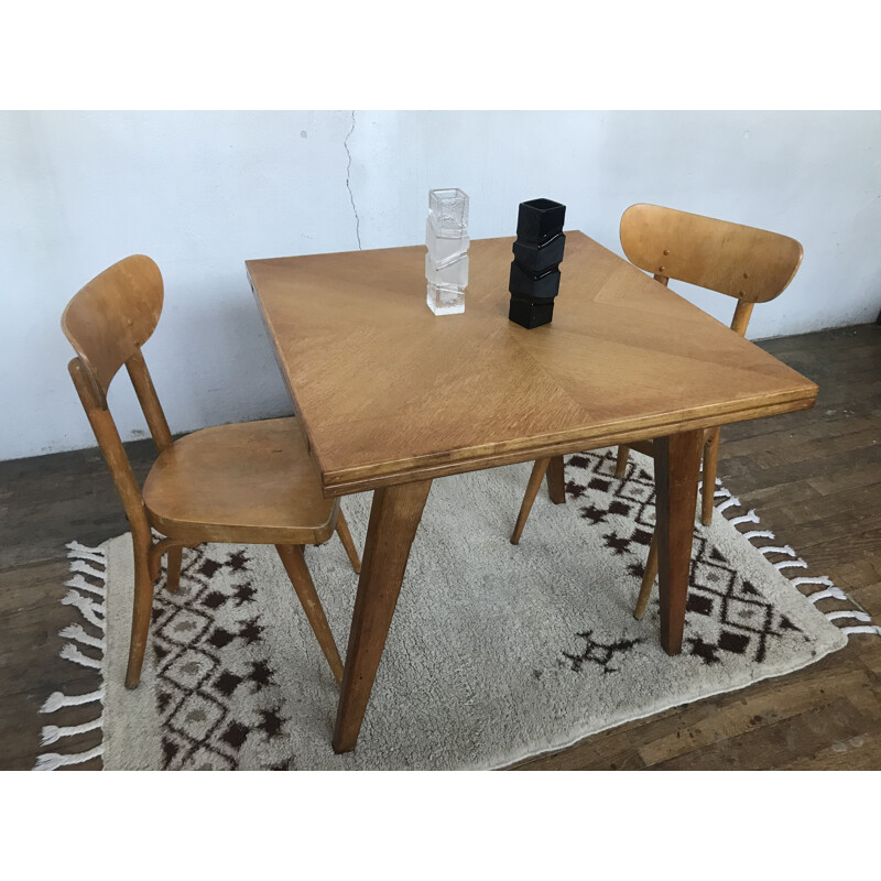 Table vintage pieds compas en chêne clair modulable 1950