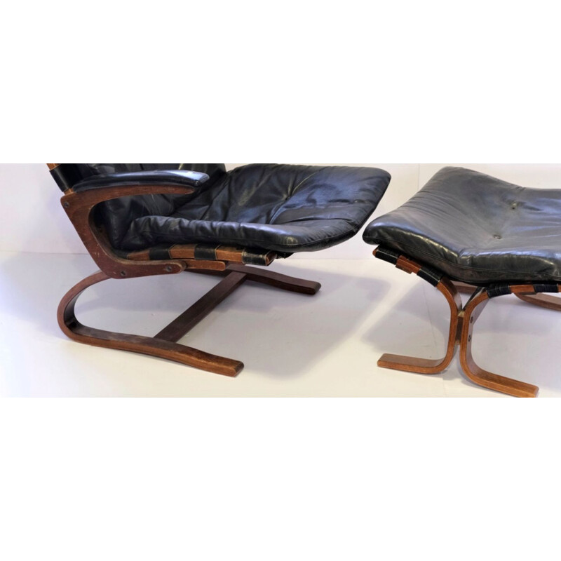 Vintage armchair Elsa &Nordahl Solheim and its ottoman for Rybo Rykken &Co in black leather 1960