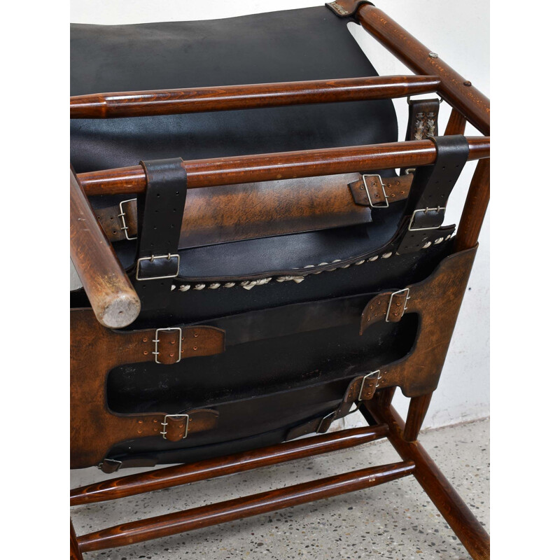 Fauteuil lounge vintage avec tabouret Safari en cuir