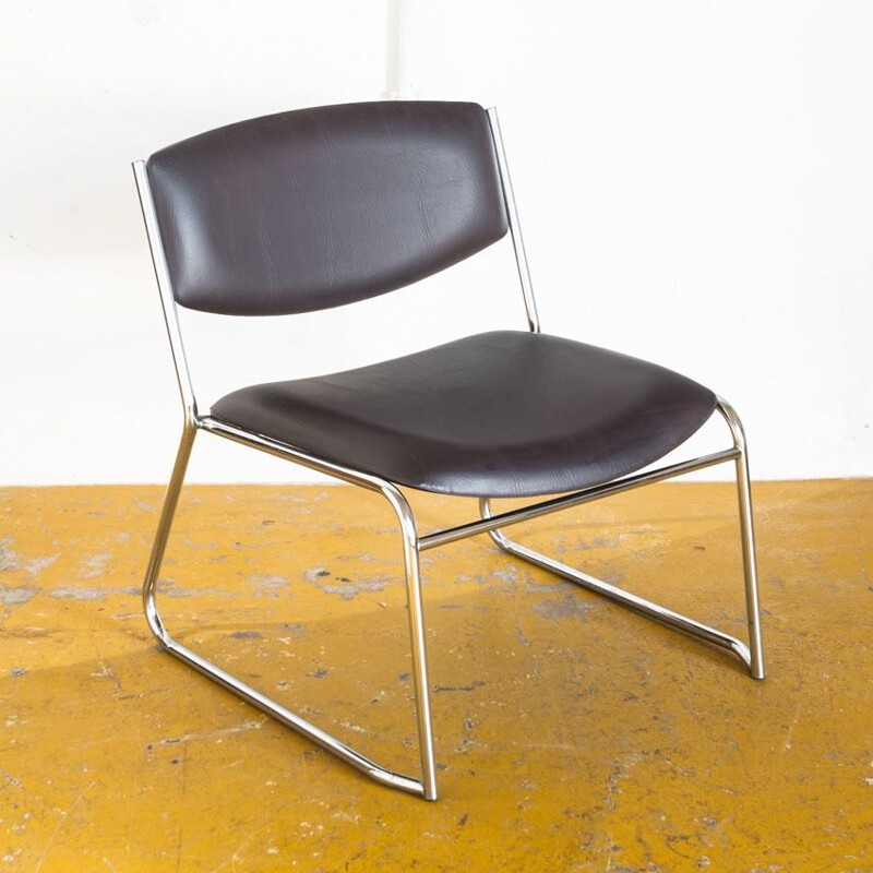 Vintage low chair in leatherette and chromed iron France 1980