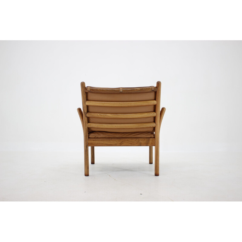 Vintage rosewood armchair from Illum Wikkelsø, Denmark 1960