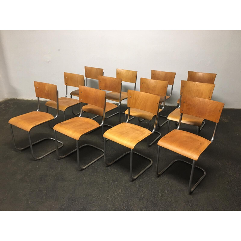 Lot de 12 chaises vintage en acier tubulaire Mart Stam