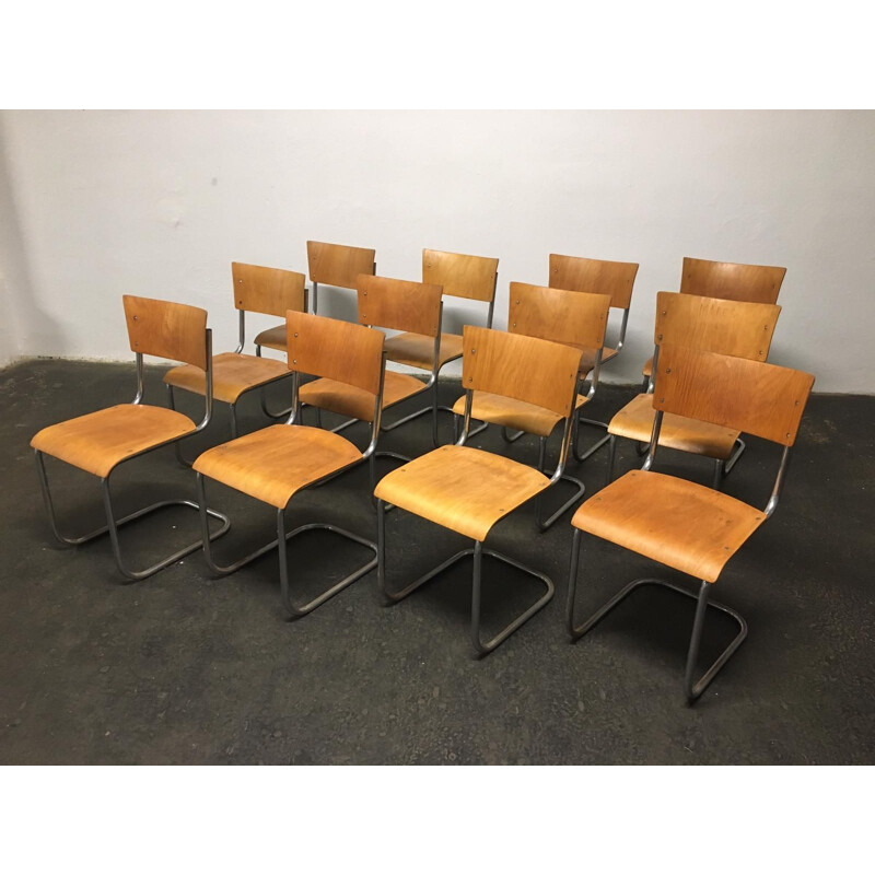 Set of 12 vintage tubular steel chairs Mart Stam