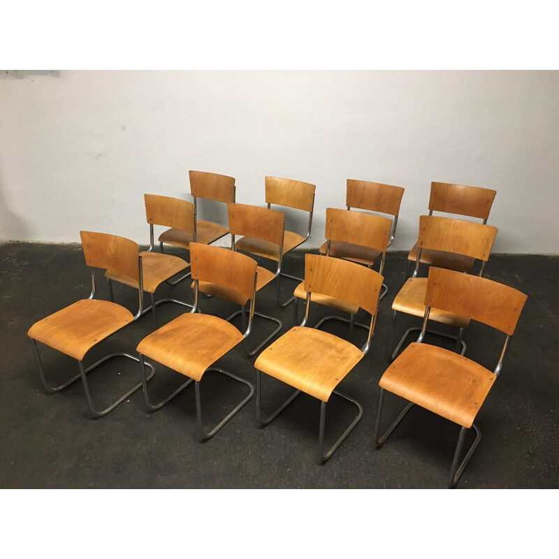 Set of 12 vintage tubular steel chairs Mart Stam