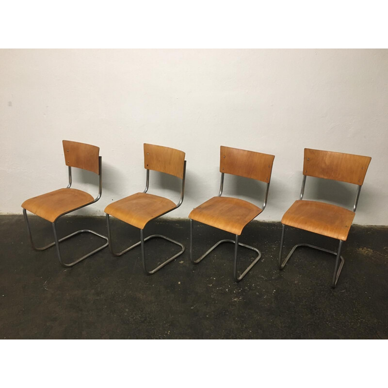 Set of 12 vintage tubular steel chairs Mart Stam