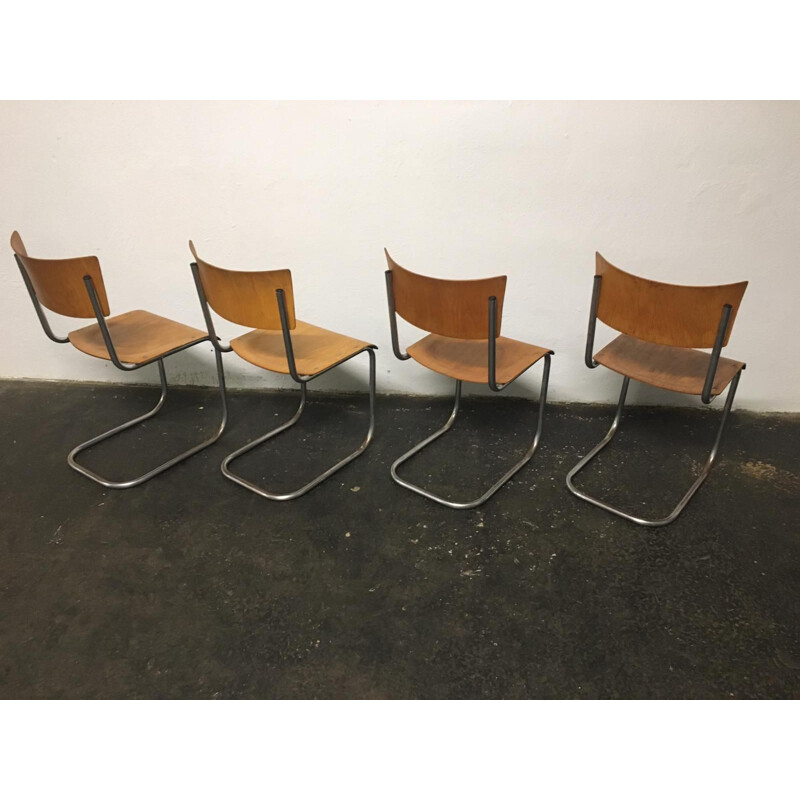 Lot de 12 chaises vintage en acier tubulaire Mart Stam