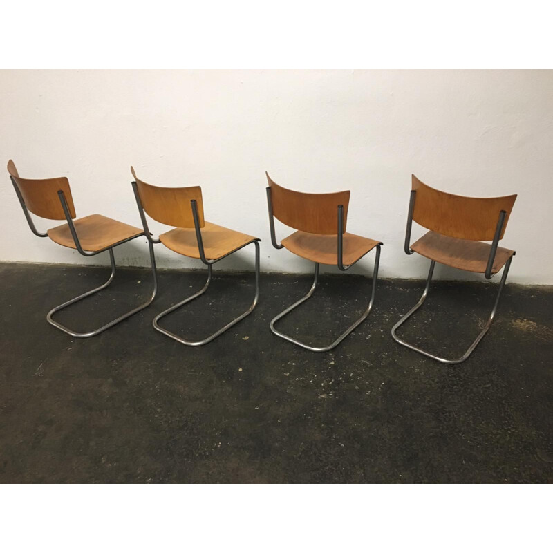 Set of 12 vintage tubular steel chairs Mart Stam