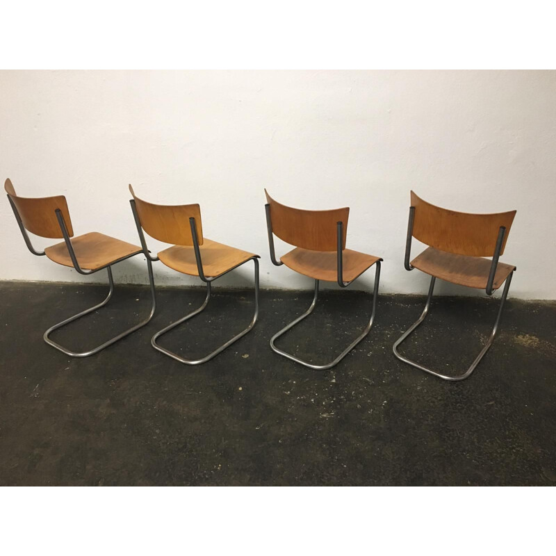 Set of 12 vintage tubular steel chairs Mart Stam