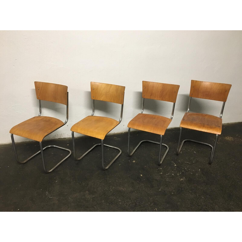 Set of 12 vintage tubular steel chairs Mart Stam