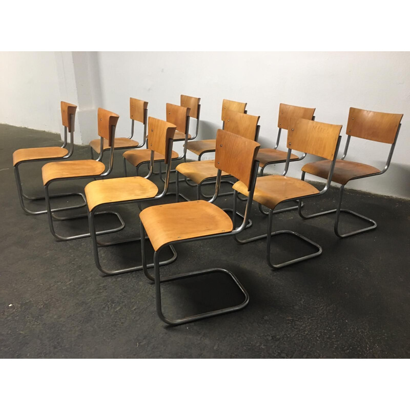 Set of 12 vintage tubular steel chairs Mart Stam