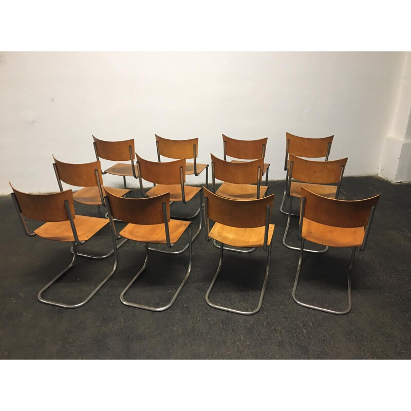 Set of 12 vintage tubular steel chairs Mart Stam