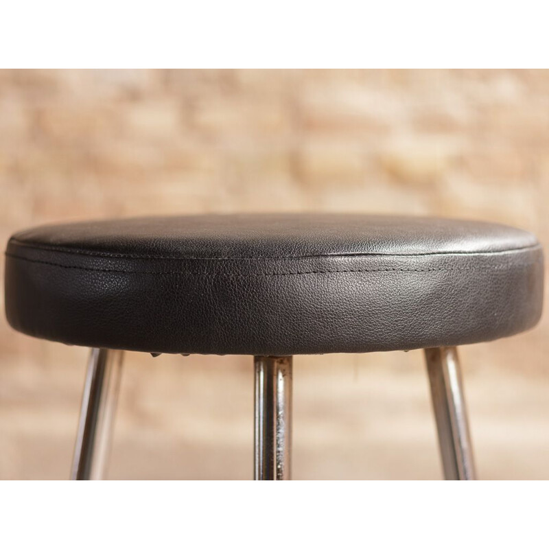 Pair of vintage stools in black imitation leather and chromed steel legs