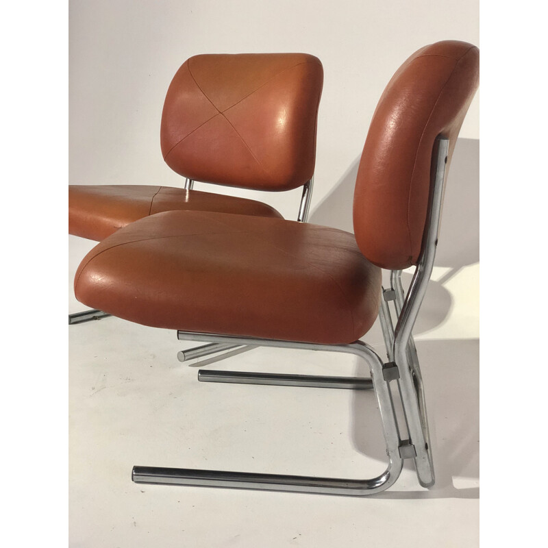 Pair of vintage leather and chrome armchairs