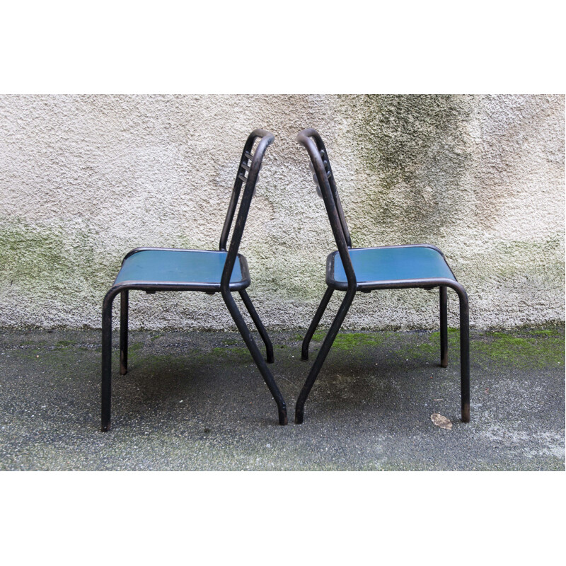 Paar vintage tolixstoelen in hout en skai van Jean Pauchard
