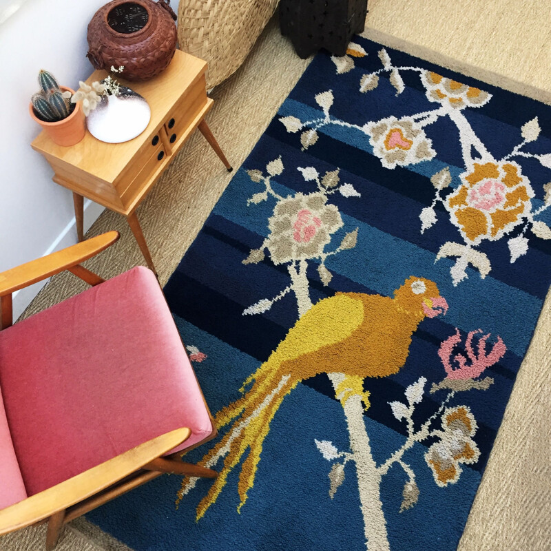 Vintage woolen rug with bird pattern