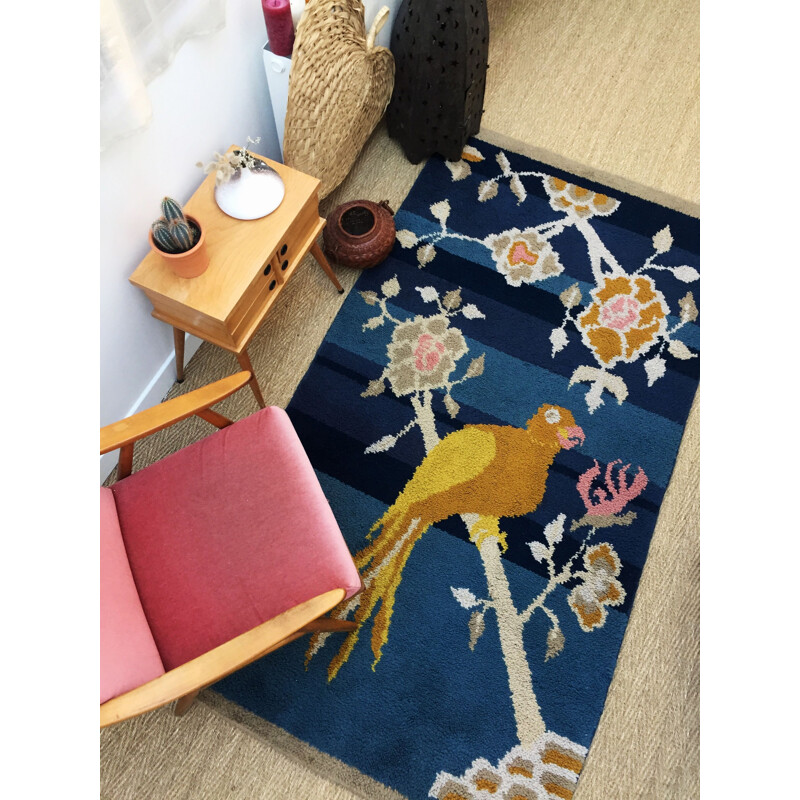 Vintage woolen rug with bird pattern