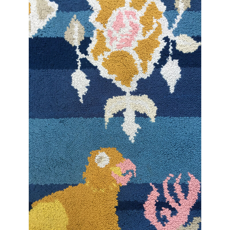 Vintage woolen rug with bird pattern