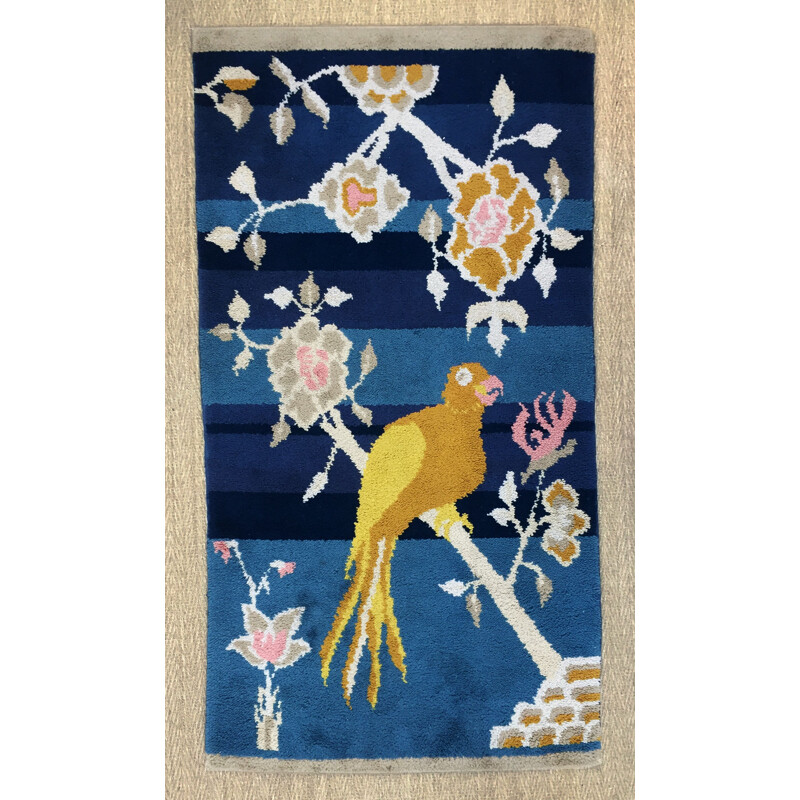 Vintage woolen rug with bird pattern
