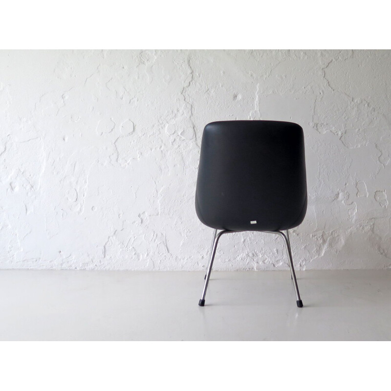 Vintage leatherette in a metal base chair, 1970s