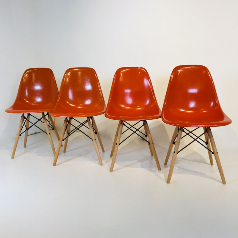 4 Vintage Orange DSW chairs by Charles & Ray Eames, USA 1977