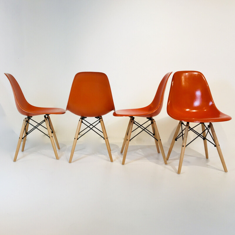 4 Vintage Orange DSW chairs by Charles & Ray Eames, USA 1977