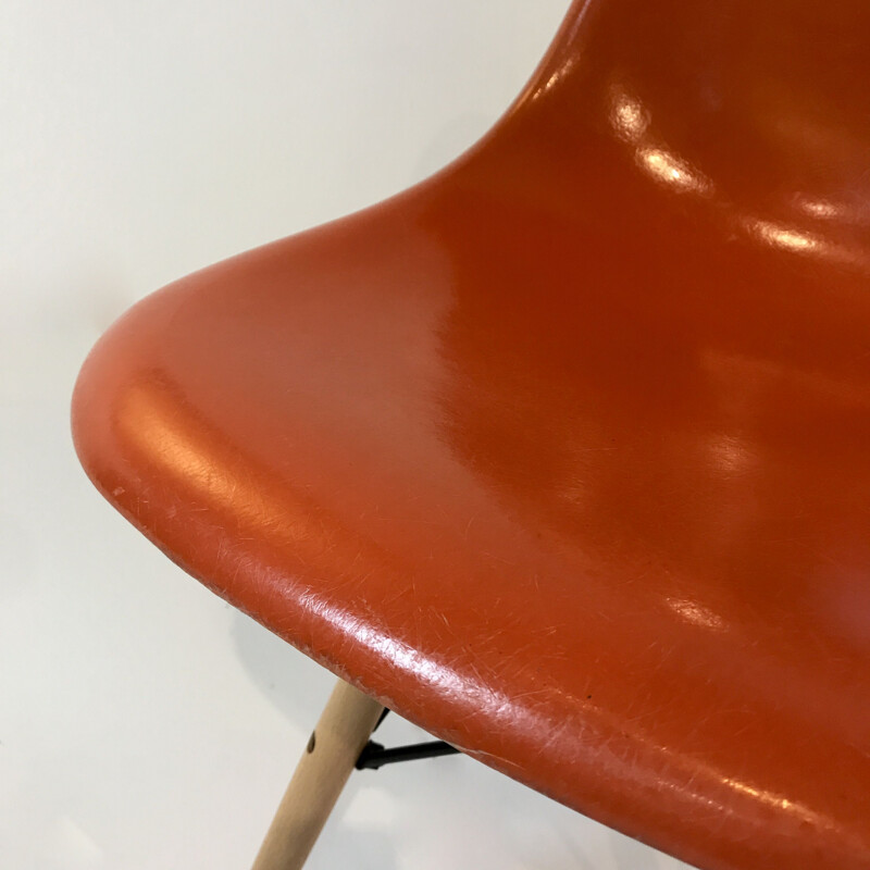 4 Vintage Orange DSW chairs by Charles & Ray Eames, USA 1977