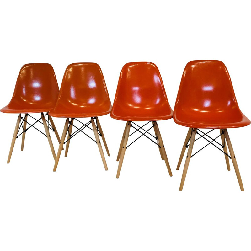 4 Vintage Orange DSW chairs by Charles & Ray Eames, USA 1977