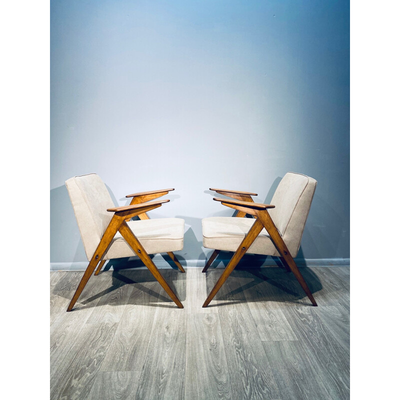 Paire de fauteuils Vintage en bois foncé pour lapin de Chierowski. 1970
