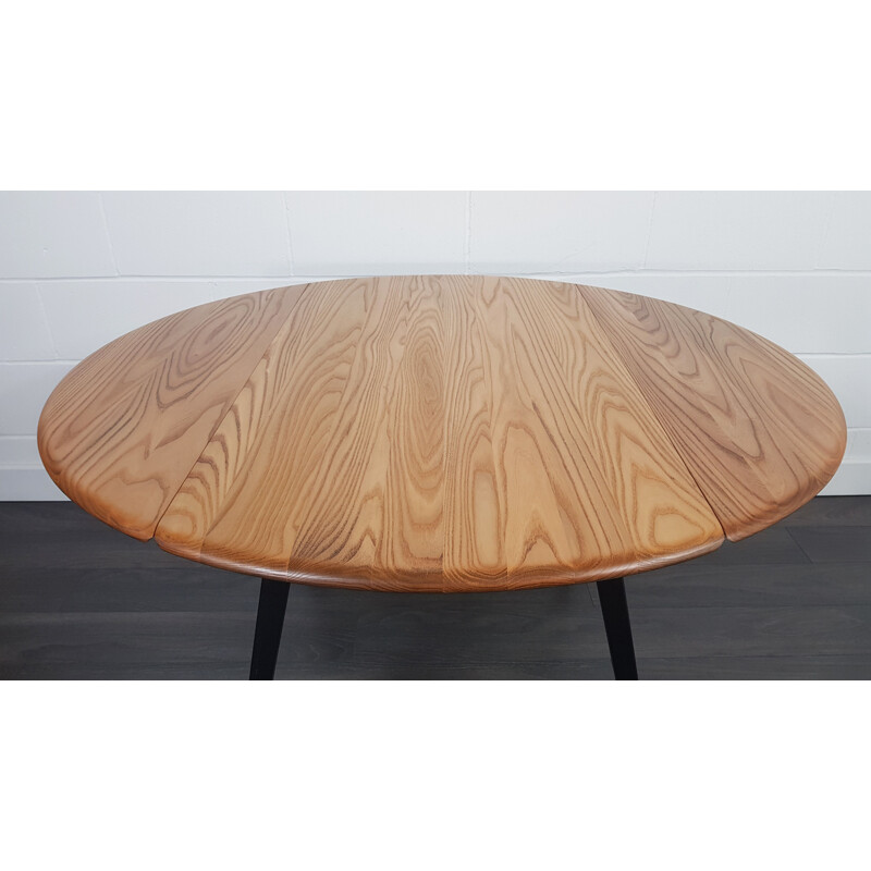 Vintage Round Drop Leaf Dining Table Ercol Black Leg, 1960s