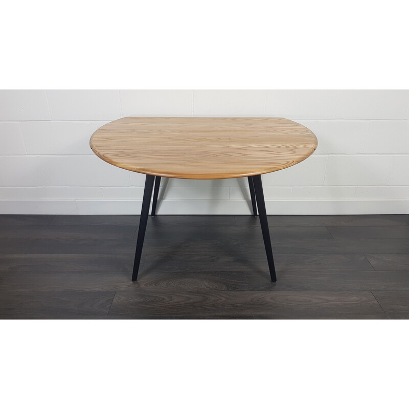 Vintage Round Drop Leaf Dining Table Ercol Black Leg, 1960s