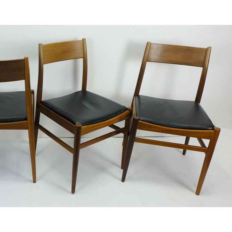 4 chaises vintage  en acajou et cuir noir 1960