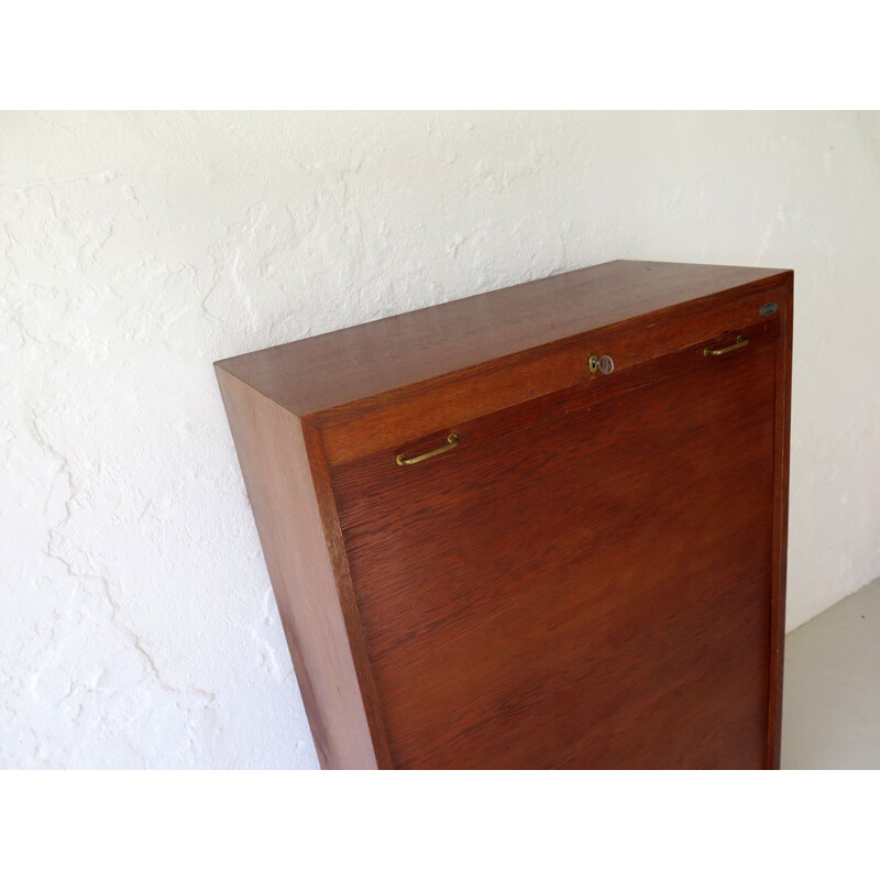 Vintage rolling door cabinet, 1950s