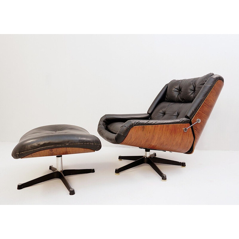 Vintage black leather armchair and pouffe