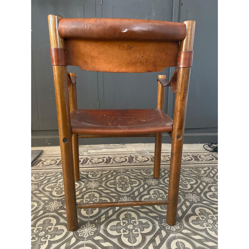 Vintage armchair 'ibisco' in wood and leather Italy 1960