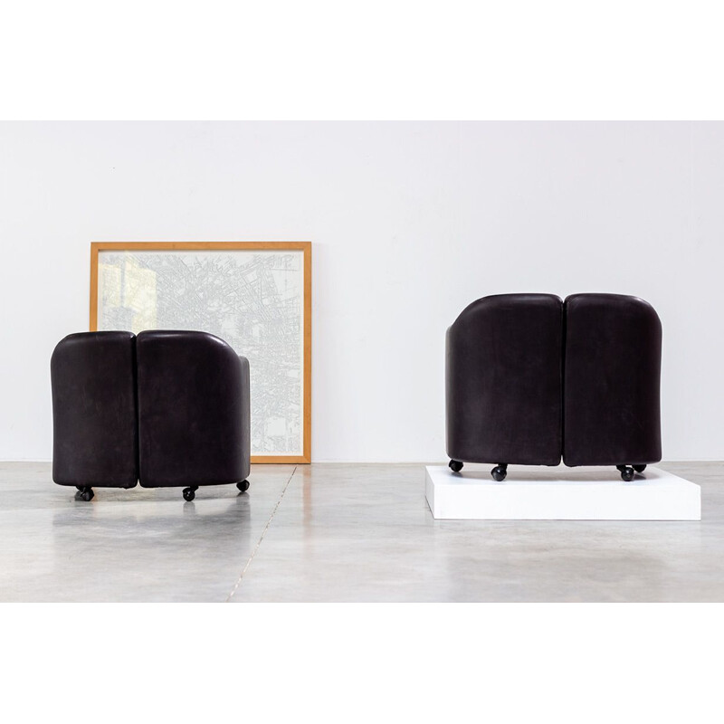 Pair of vintage black leather lounge chairs from the 142 series by Eugenio Gerli for Tecno Milano, 1960